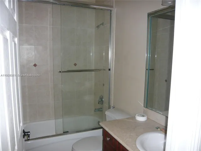 a view of a backyard with a patio