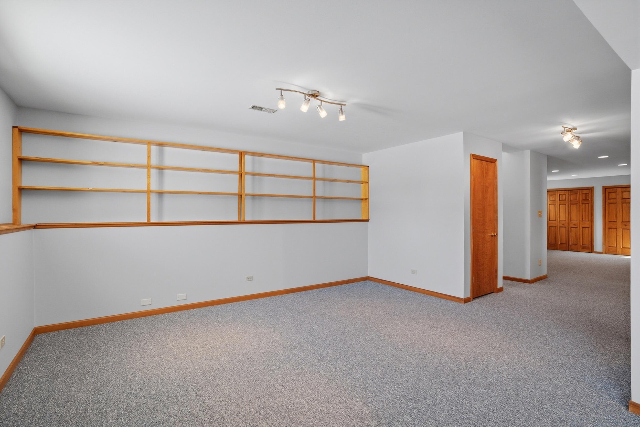 5125 Cardinal Court Schererville, IN 46375 - Photo 18 of 27 a view of an empty room with a window