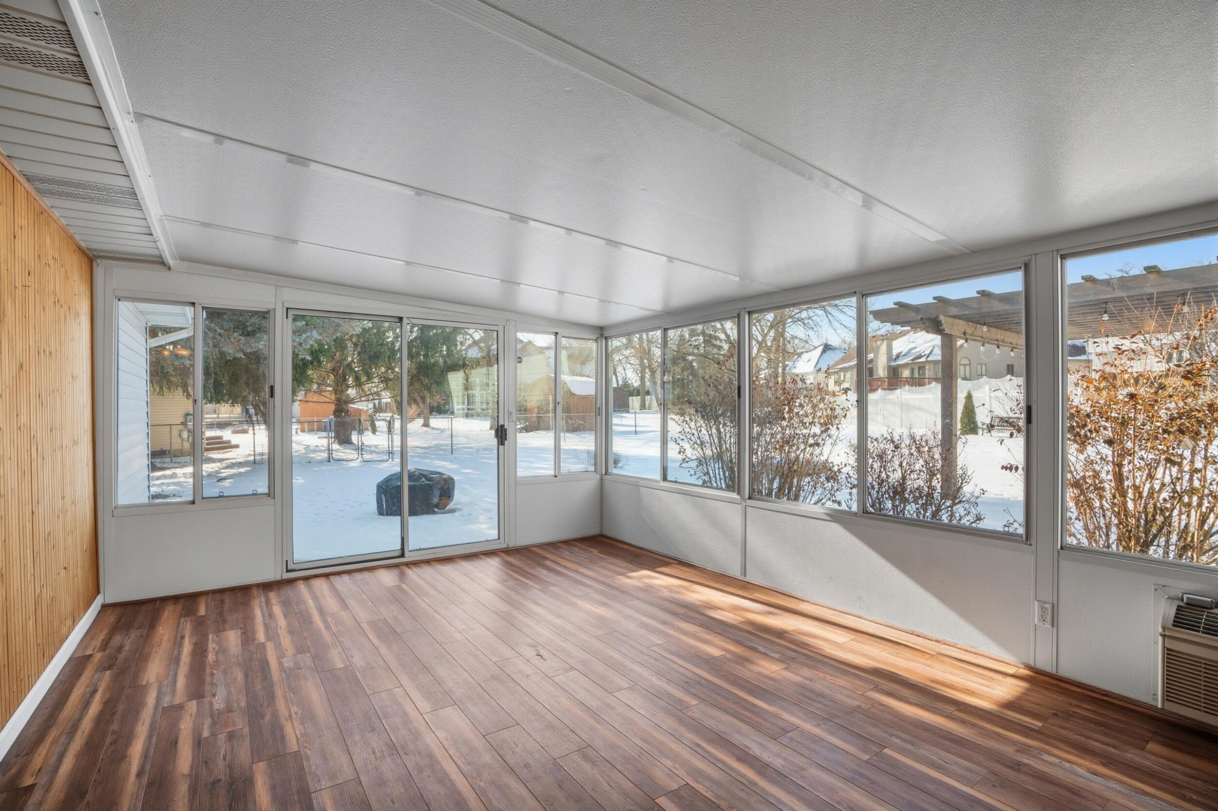 5125 Cardinal Court Schererville, IN 46375 - Photo 25 of 27 a view of empty room with wooden floor and fan