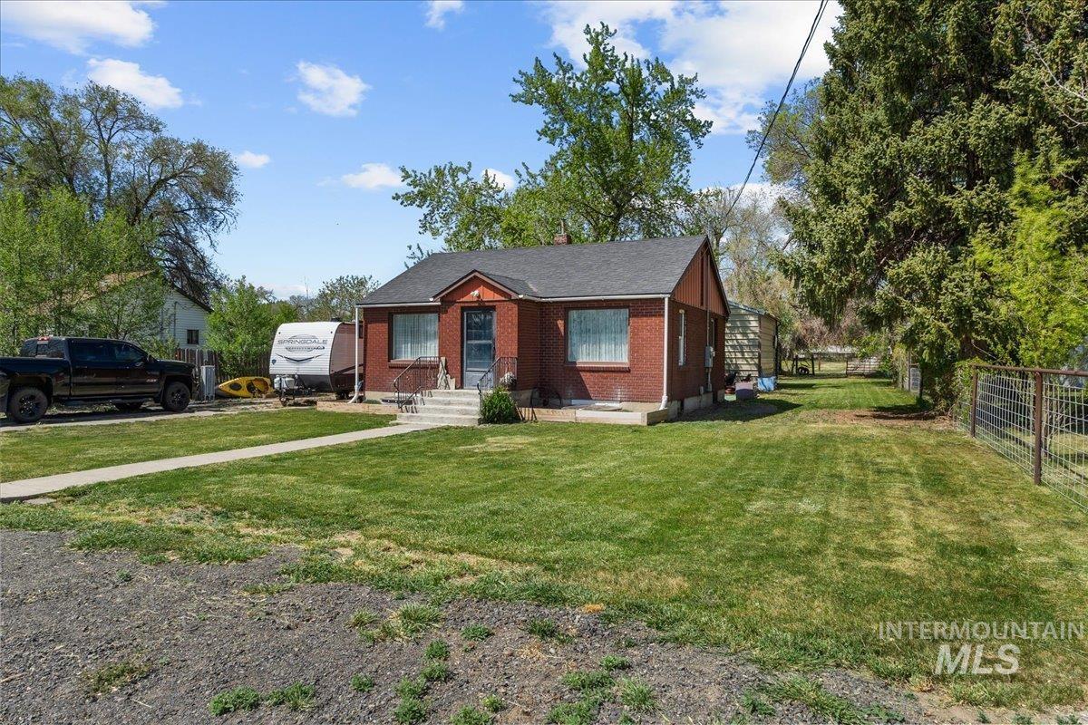 1958 East 1775 South Gooding, ID 83330 - Photo 6 of 49 Red brick exterior with a contrasting gable and dark roof