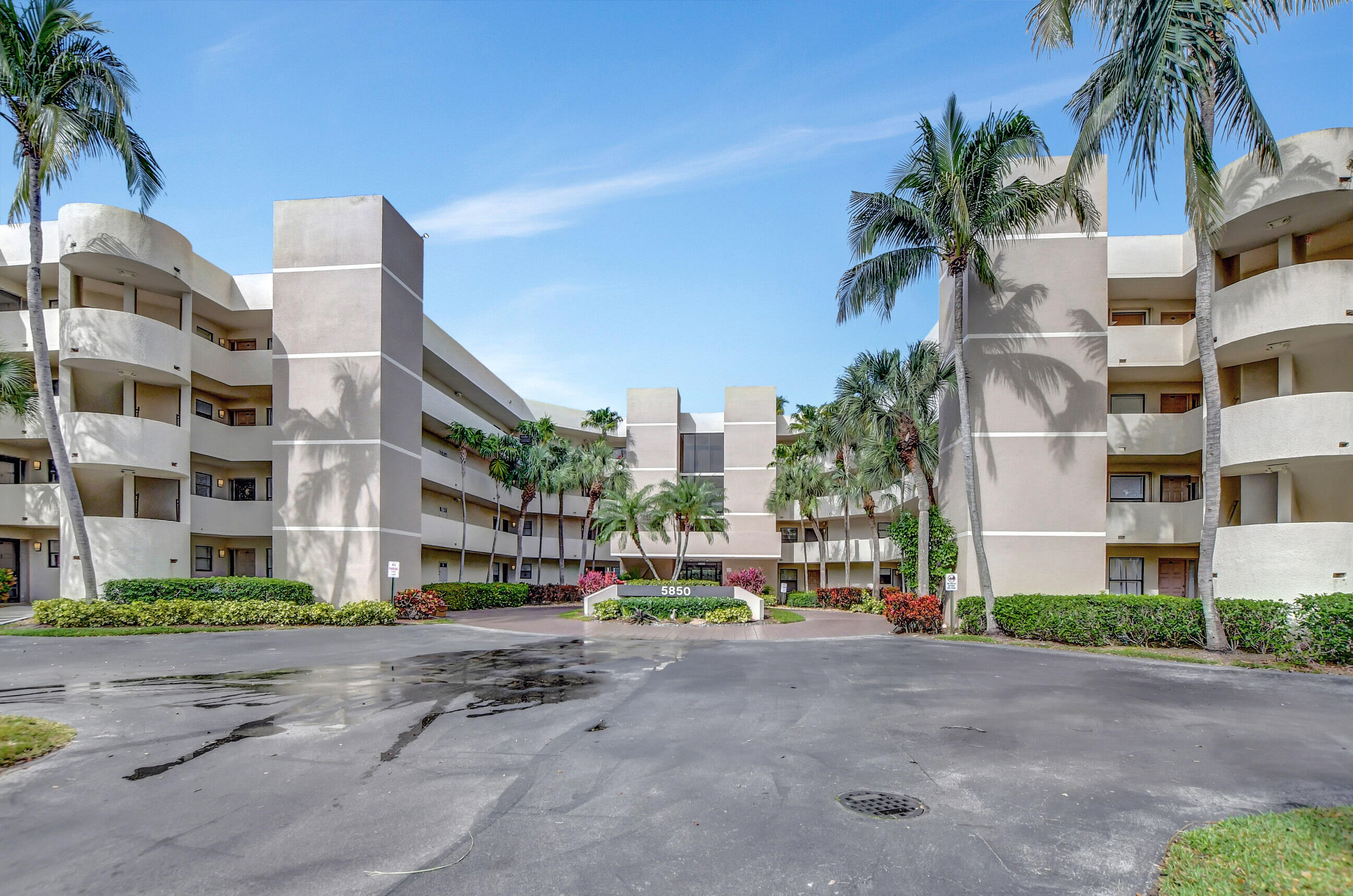 5850 Camino Del Sol, Unit 407 Boca Raton, FL 33433 - Photo 48 of 49 FRONT OF BUILDING