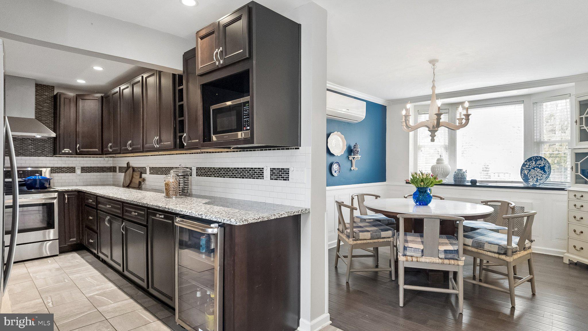 629 Willowbrook Road Havertown, PA 19083 - Photo 12 of 33 a kitchen with stainless steel appliances granite countertop a sink and a stove