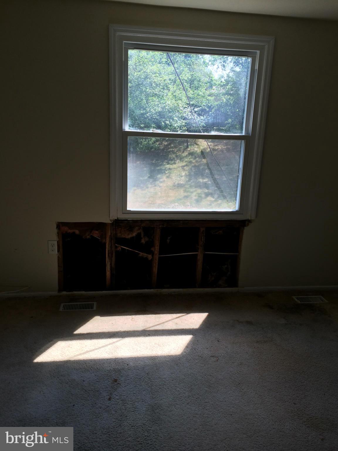 3513 Chado Road Clinton, MD 20735 - Photo 5 of 6 a living room with a window