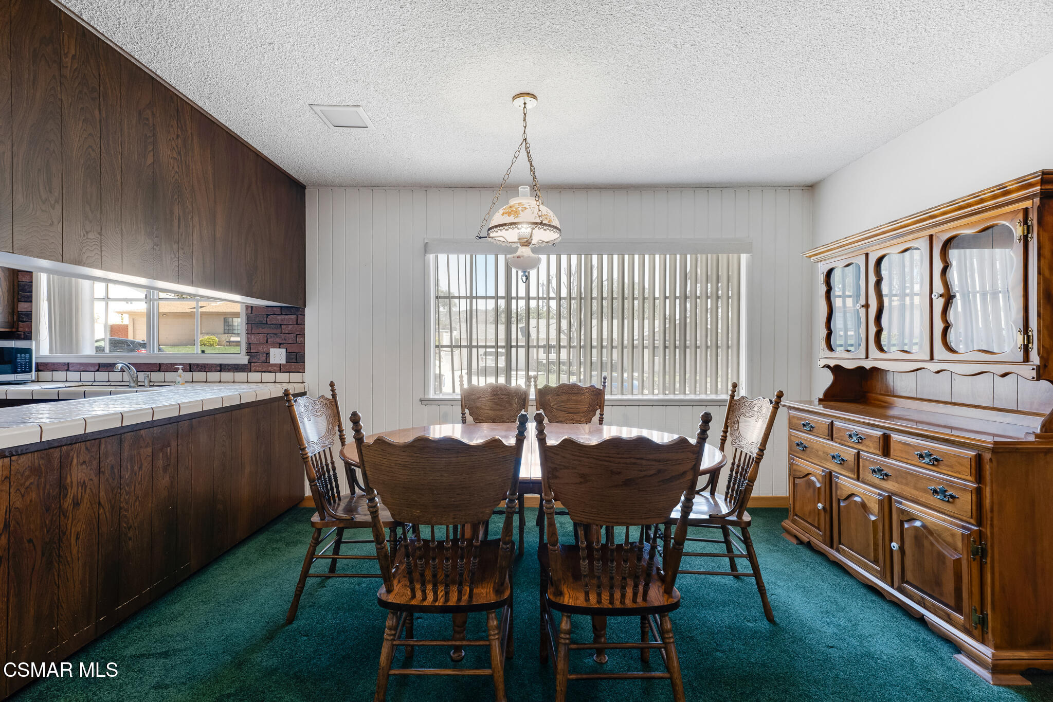 3493 Amarillo Avenue Simi Valley, CA 93063 - Photo 11 of 49 a view of a dining room with furniture window and outside view