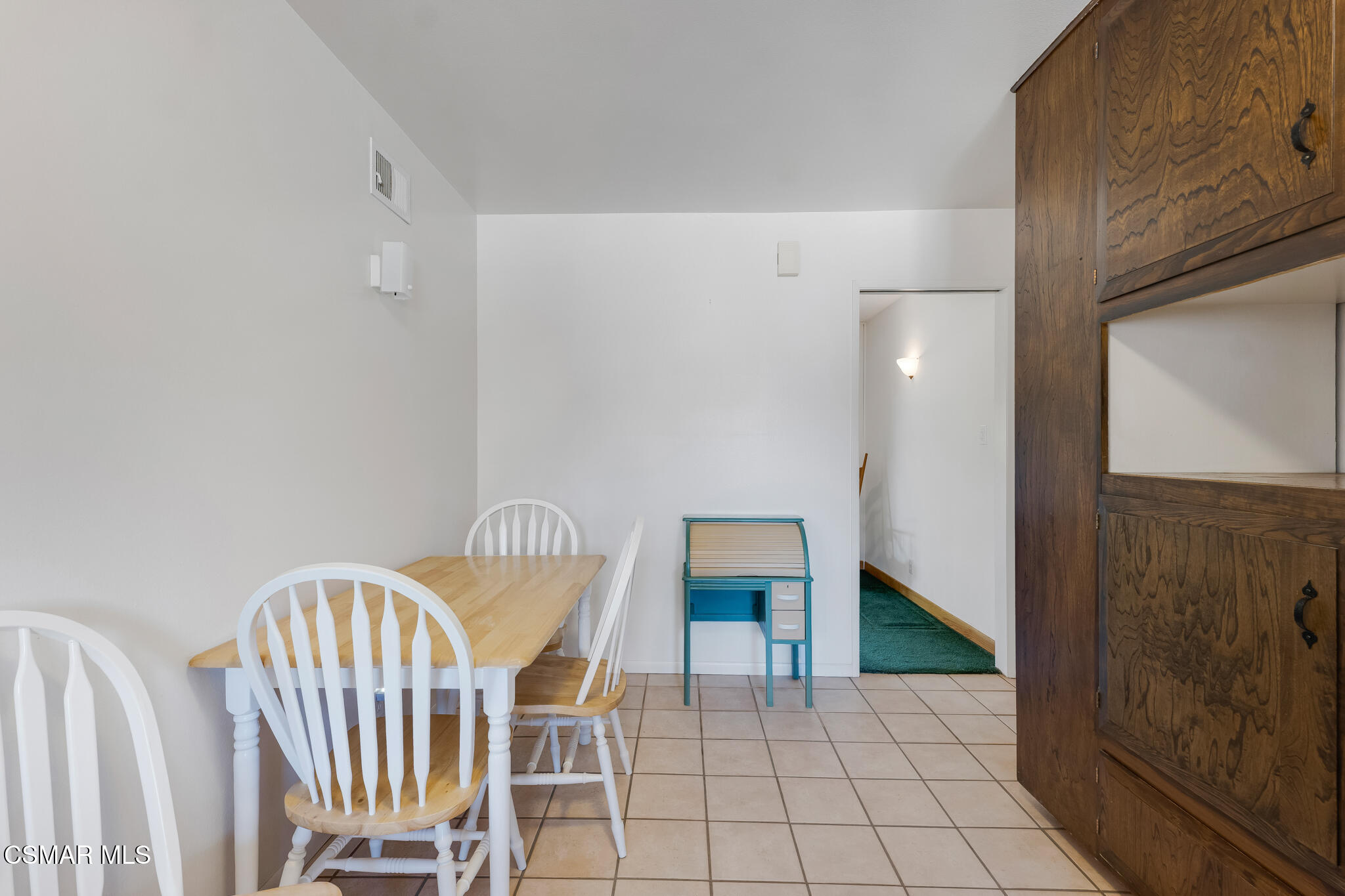 3493 Amarillo Avenue Simi Valley, CA 93063 - Photo 16 of 49 a view of a hallway with chairs and front door