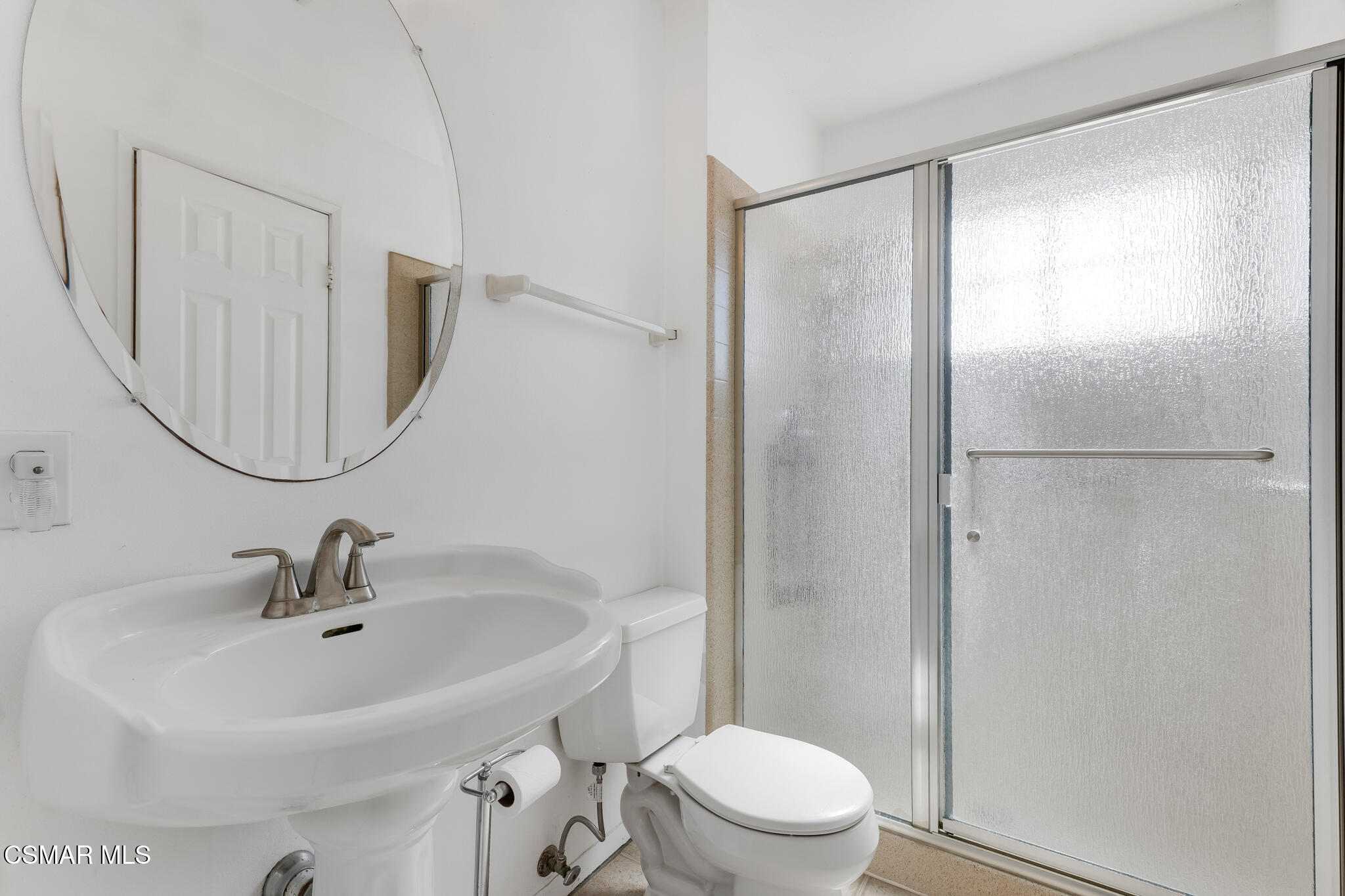 3493 Amarillo Avenue Simi Valley, CA 93063 - Photo 30 of 49 a bathroom with a sink toilet and a mirror