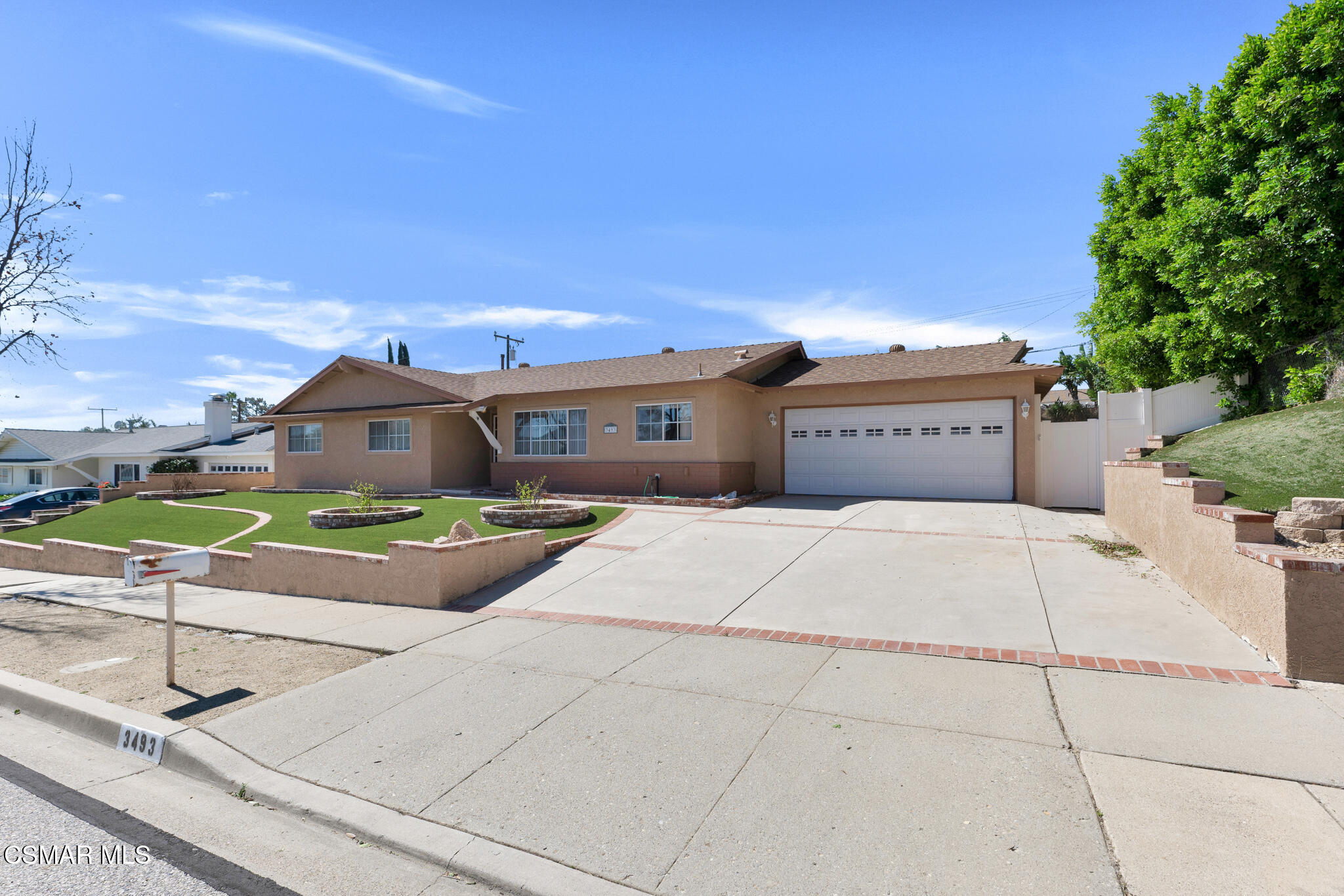 3493 Amarillo Avenue Simi Valley, CA 93063 - Photo 49 of 49 a front view of a house with a garden