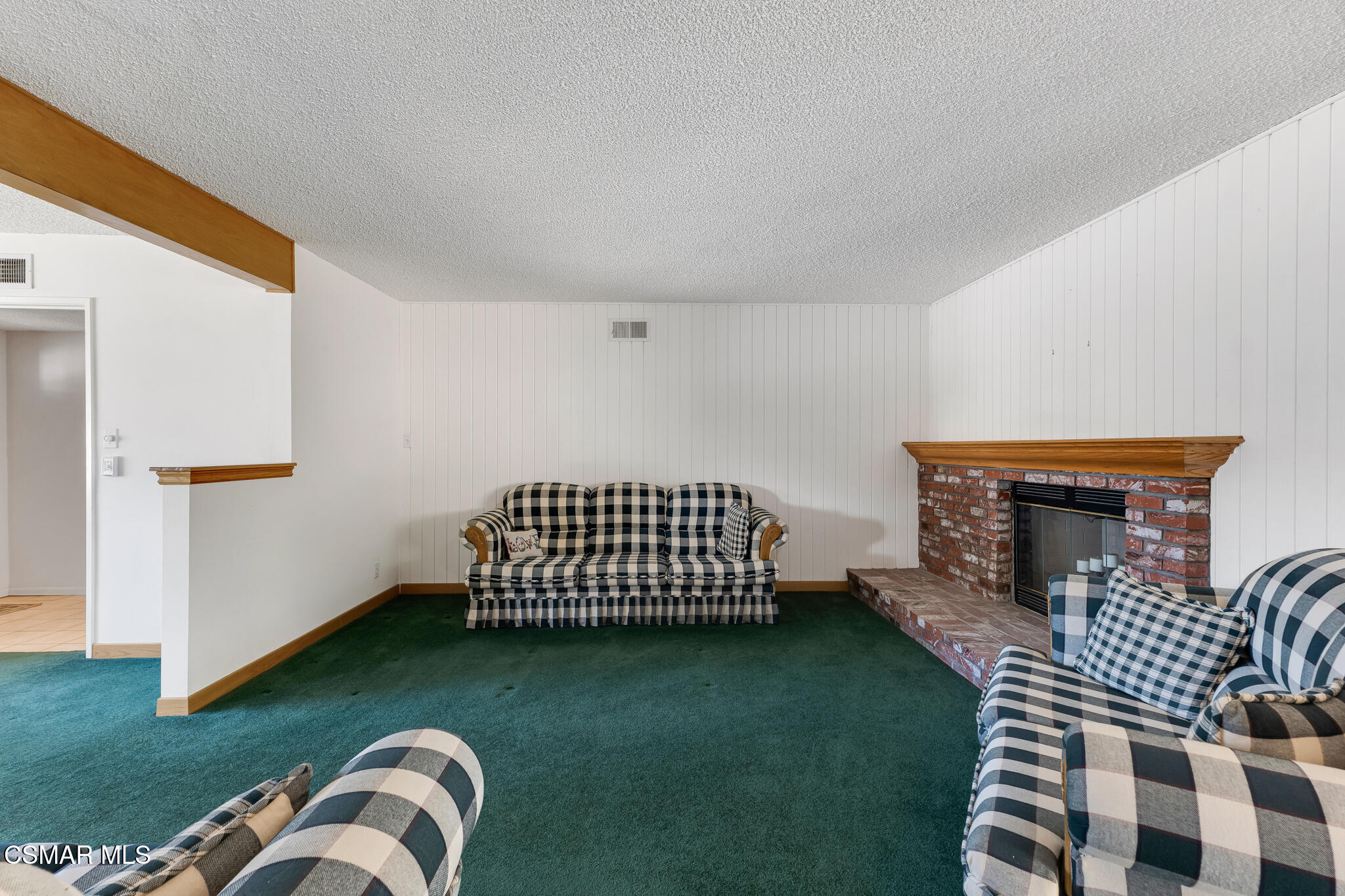 3493 Amarillo Avenue Simi Valley, CA 93063 - Photo 7 of 49 a bedroom with a bed and a chandelier