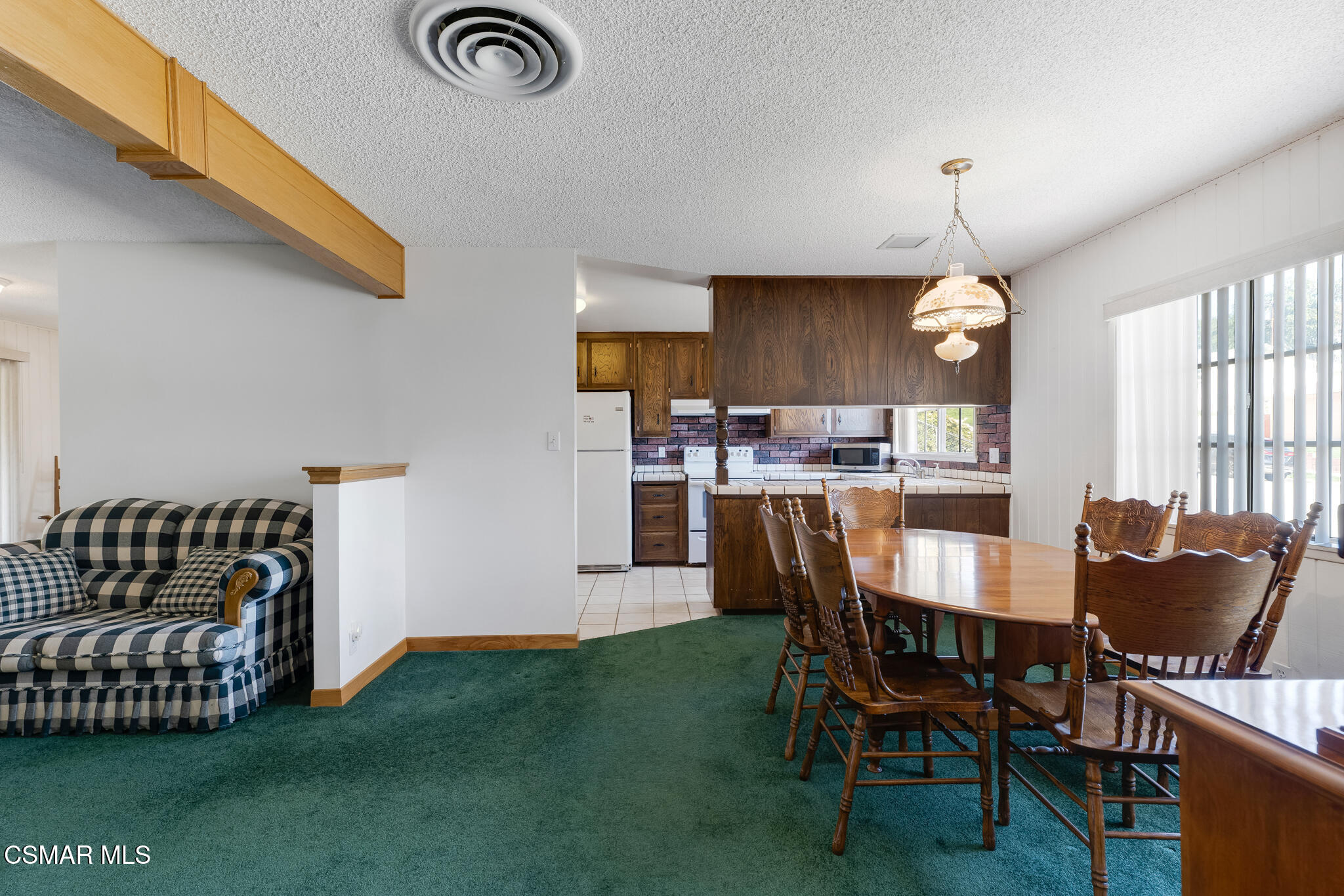 3493 Amarillo Avenue Simi Valley, CA 93063 - Photo 10 of 49 a dining room with furniture and window