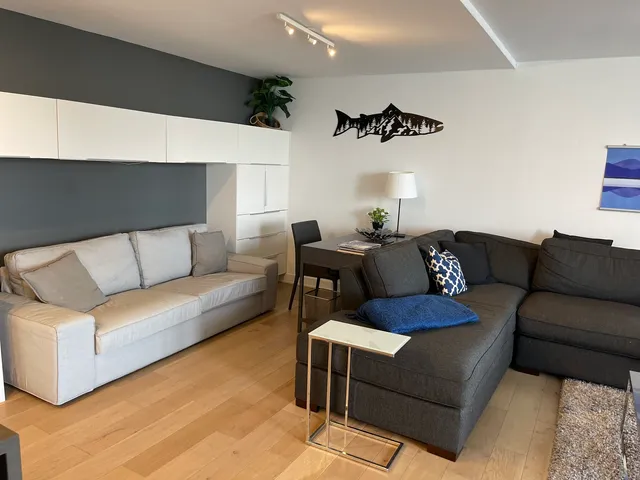 a living room with furniture and a couch