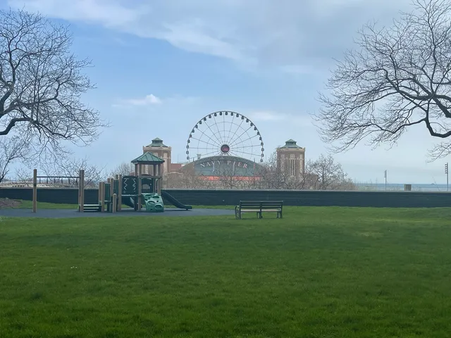 a lobby with furniture and floor to ceiling window