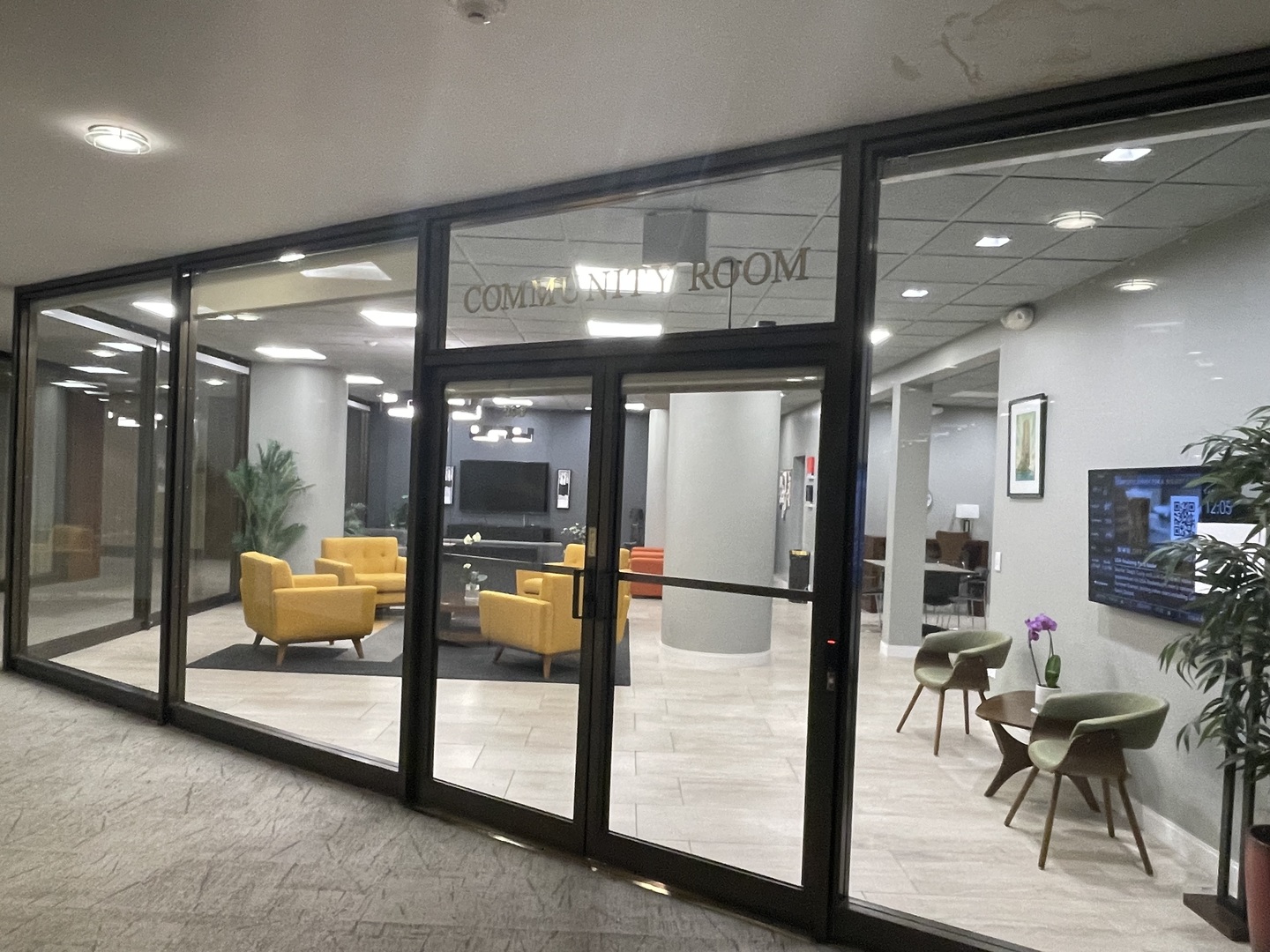 505 North Lake Shore Drive, Unit 5701 Chicago, IL 60611 - Photo 19 of 27 a lobby with furniture and floor to ceiling window