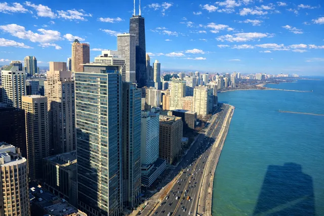 a view of a balcony with city view