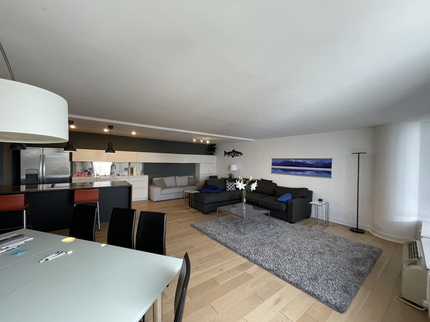 505 North Lake Shore Drive, Unit 5701 Chicago, IL 60611 - Photo 6 of 27 a kitchen with stainless steel appliances kitchen island granite countertop a refrigerator a stove top oven and a sink