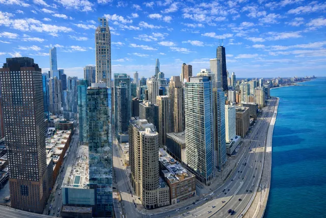 a view of a city with tall buildings