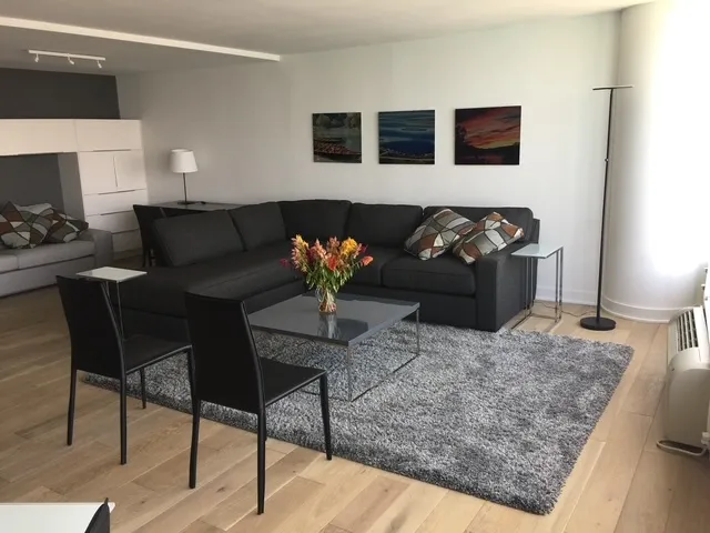 a living room with furniture and a couch