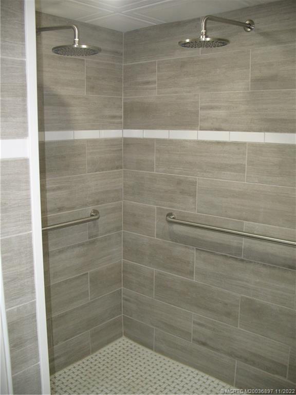 5393 Southeast Miles Grant Road, Unit A103 Stuart, FL 34997 - Photo 15 of 20 Master Bathroom Shower Stall