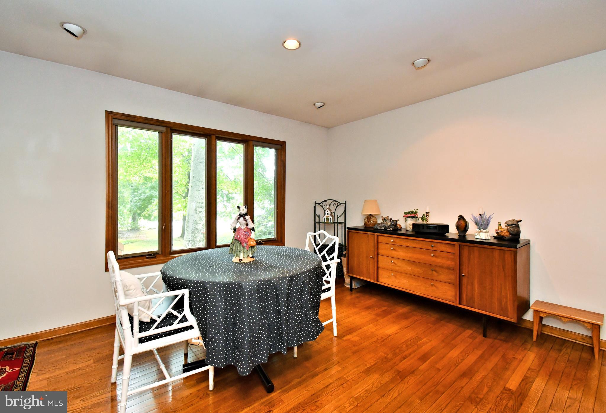 179 Almshouse Road Doylestown, PA 18901 - Photo 21 of 68 a dining room with wooden floor and furniture