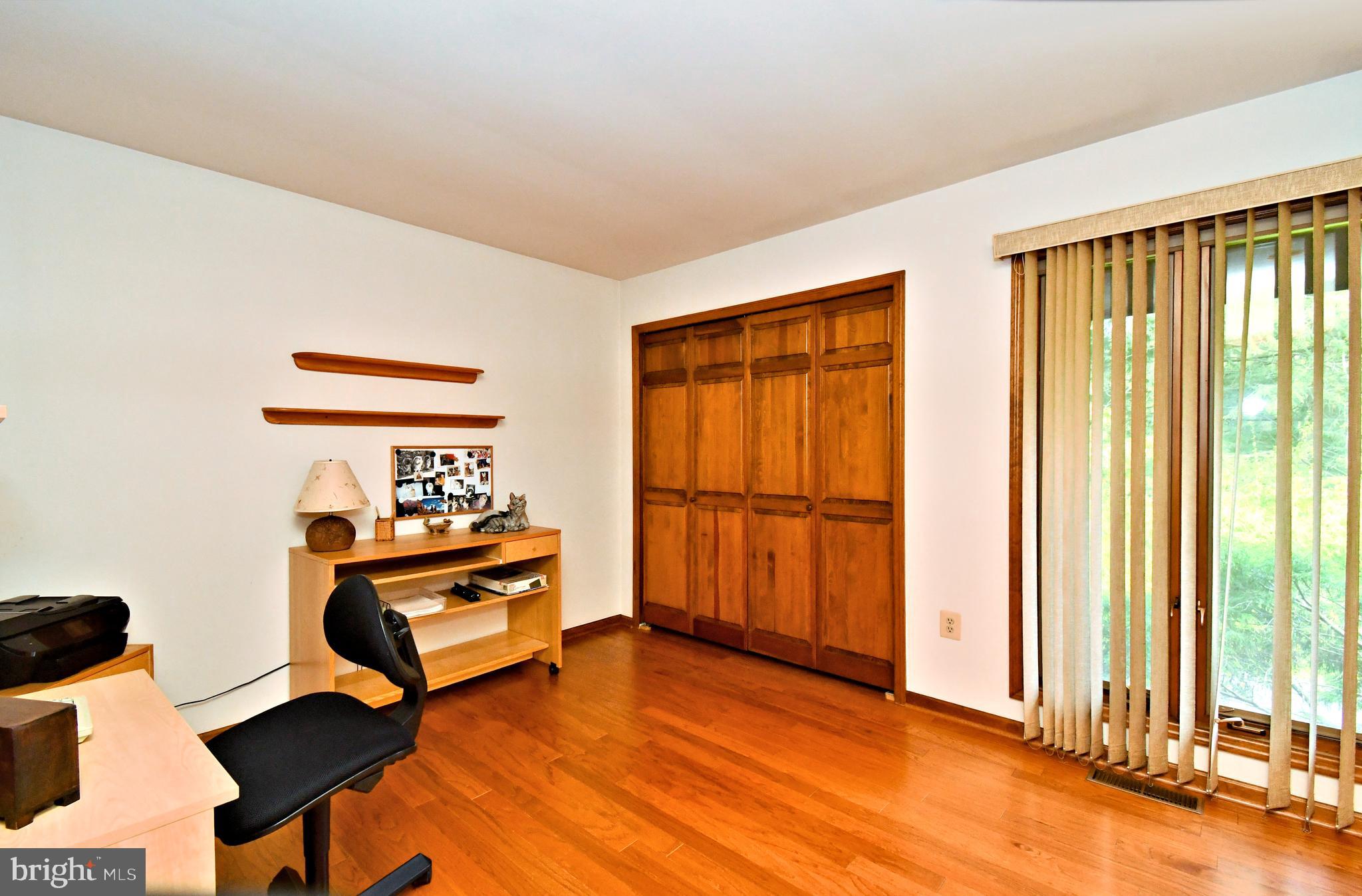 179 Almshouse Road Doylestown, PA 18901 - Photo 34 of 68 a bedroom with furniture and a window