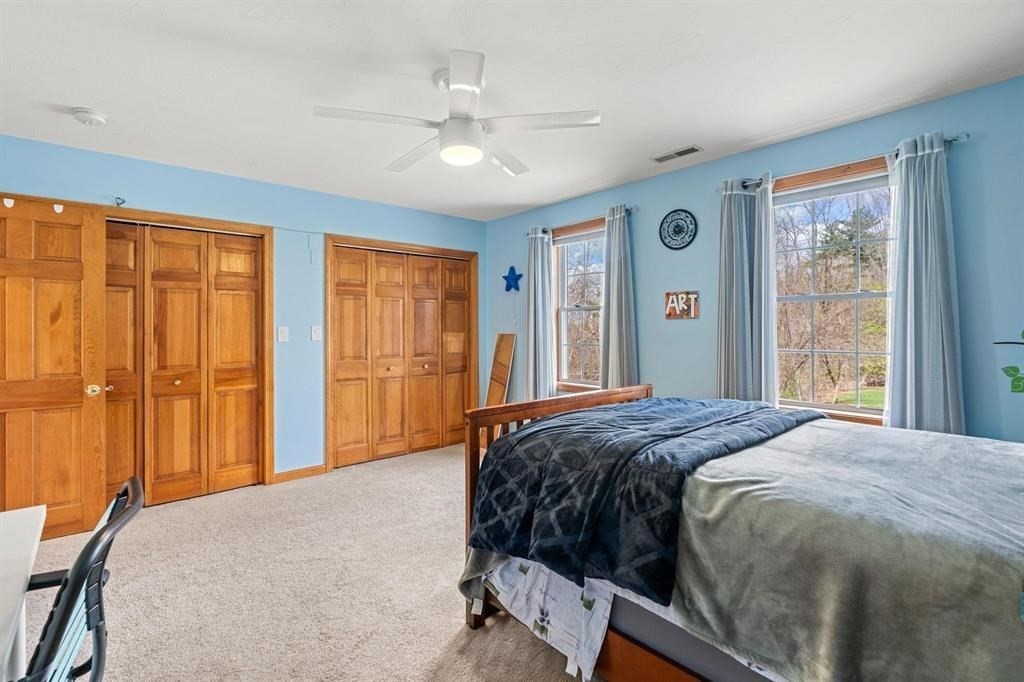 15 Lamb Road Nashua, NH 03062 - Photo 23 of 40 a bedroom with a bed and a window