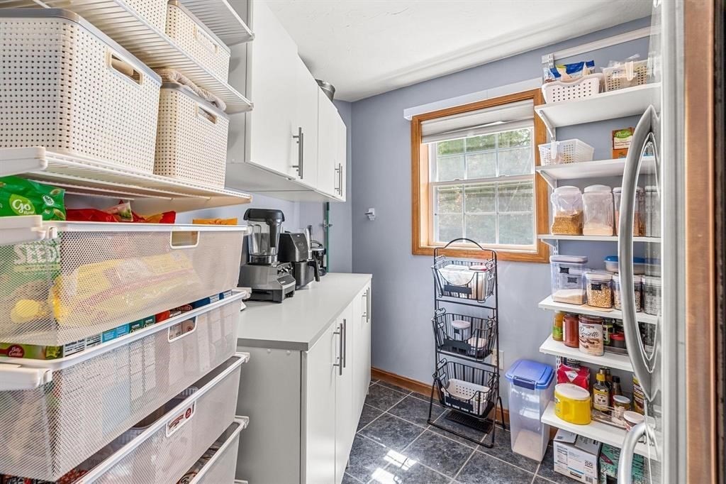 15 Lamb Road Nashua, NH 03062 - Photo 35 of 40 a room with storage and utility