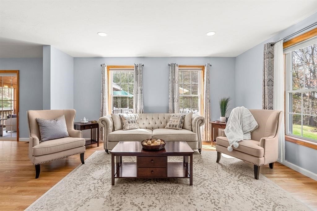15 Lamb Road Nashua, NH 03062 - Photo 10 of 40 a living room with furniture and a large window