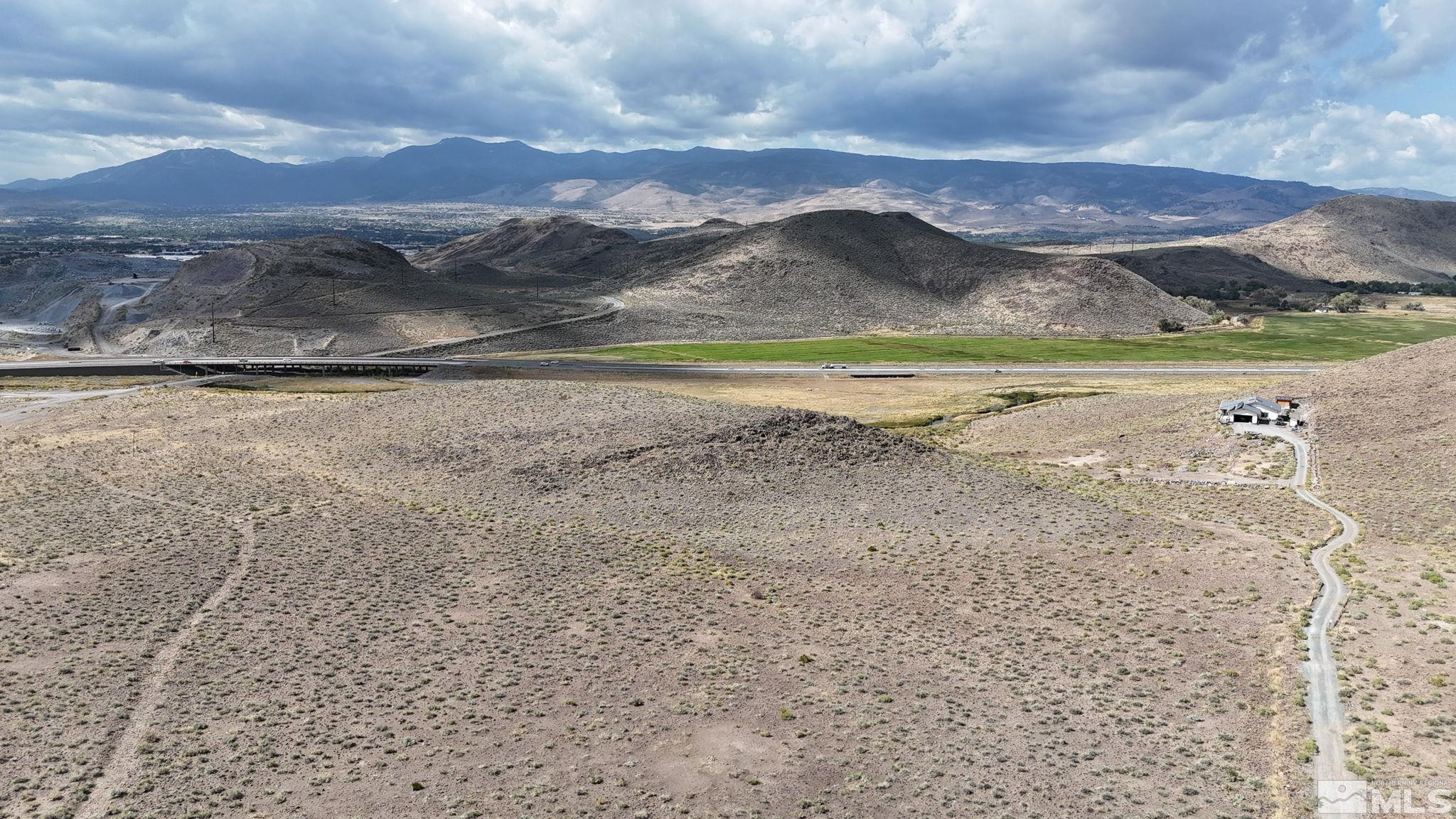 0 Desert Way Reno, NV 89502 - Photo 15 of 27 a view of a house with a mountain