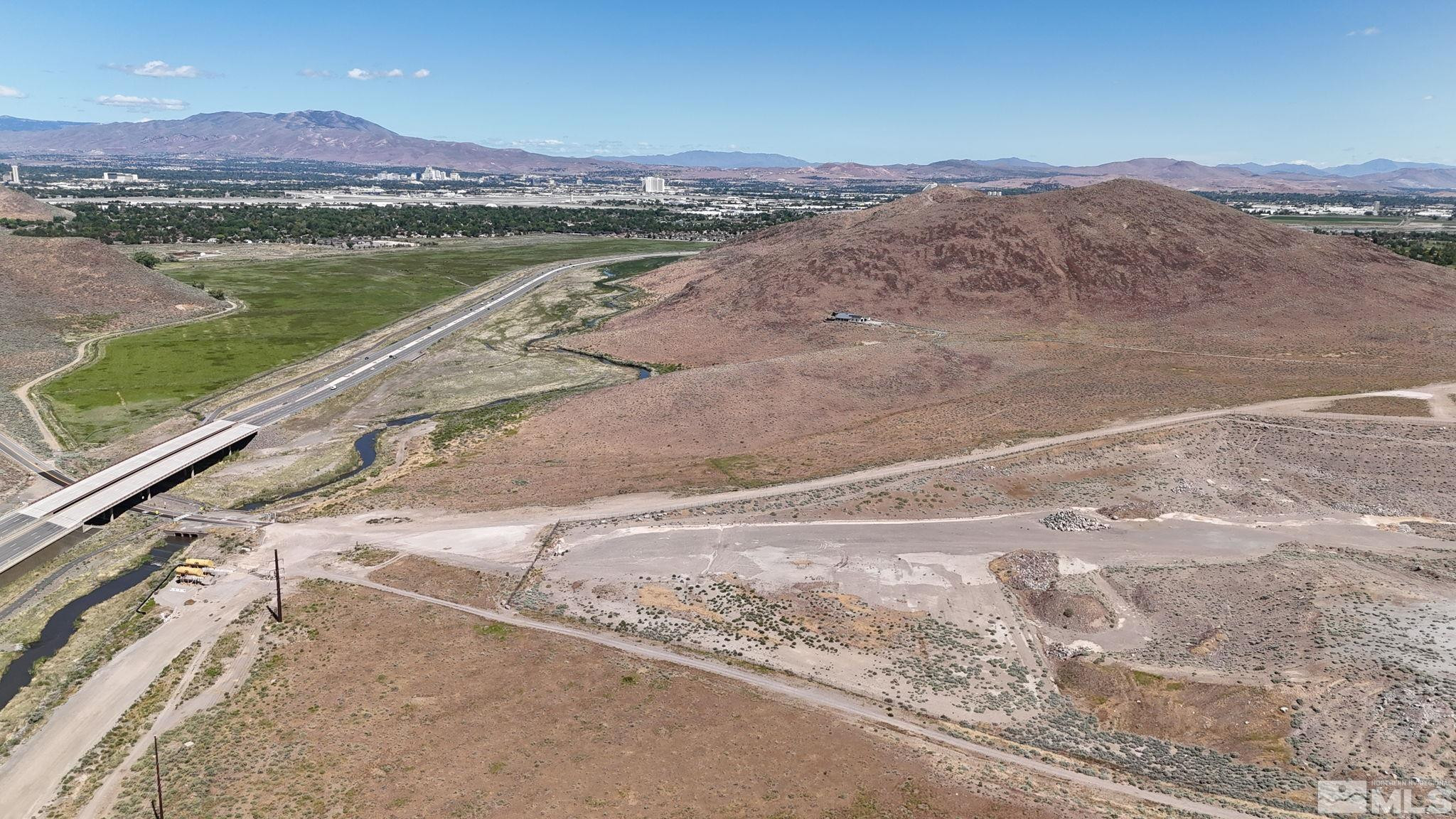 0 Desert Way Reno, NV 89502 - Photo 4 of 27 a view of a lake with a mountain