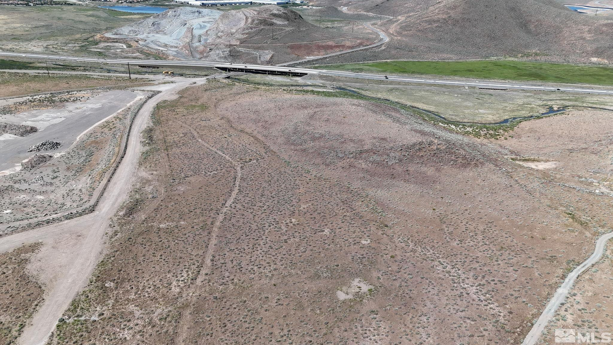 0 Desert Way Reno, NV 89502 - Photo 9 of 27 a view of a dry yard with wooden floor