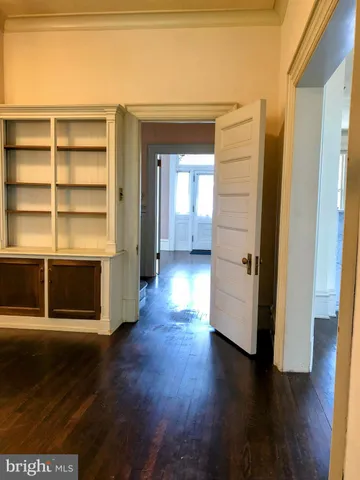 a view of entryway with wooden floor