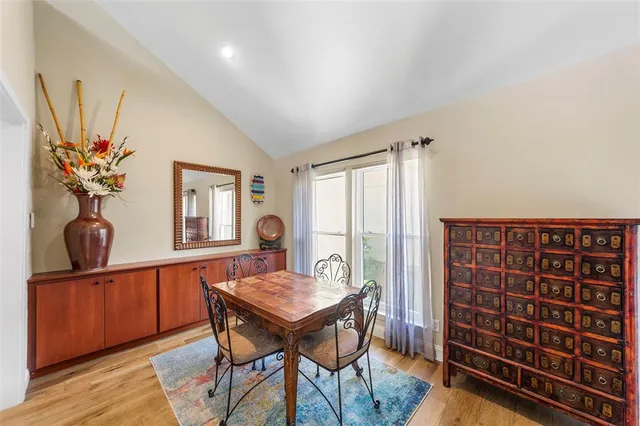 a view of a livingroom with furniture and wooden floor