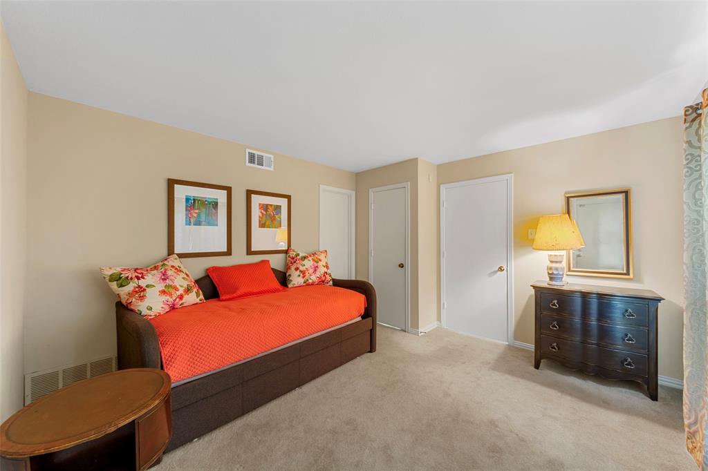 4211 Prescott Avenue, Unit 5 Dallas, TX 75219 - Photo 5 of 38 Bedroom 2; door to left is to Walk-in Closet
