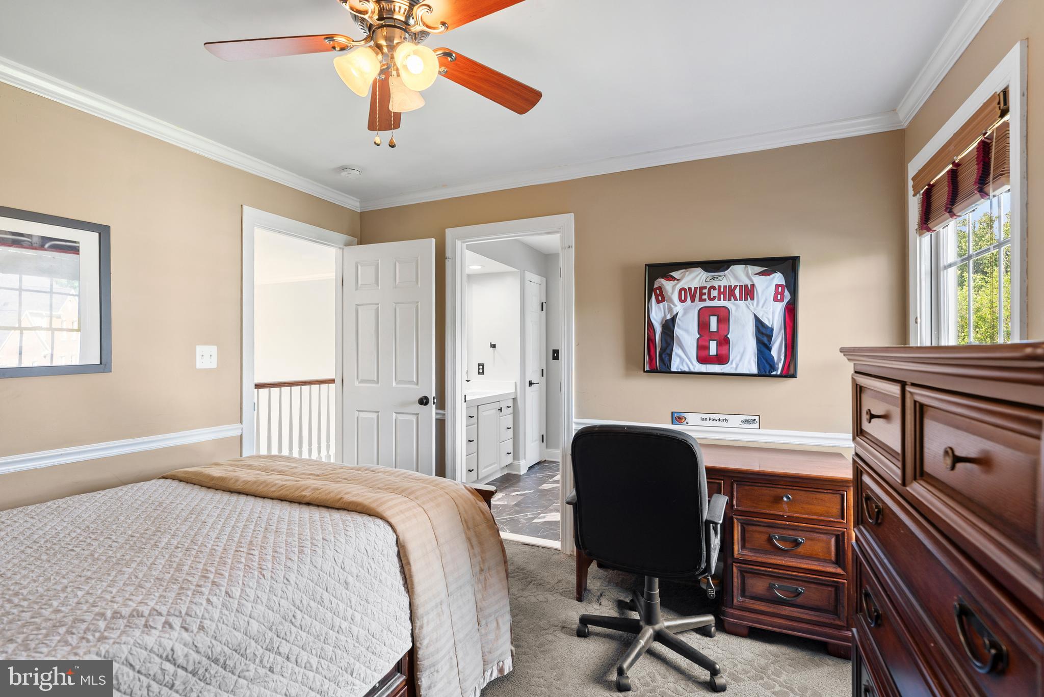7 Redtree Lane Reisterstown, MD 21136 - Photo 45 of 56 a bedroom with a bed and a chandelier