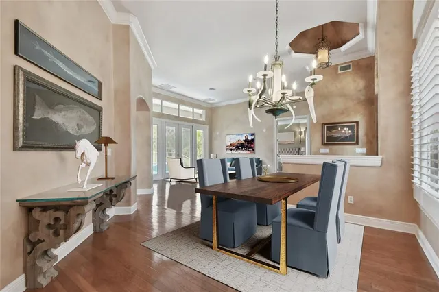 wooden floor in an empty room with a fireplace