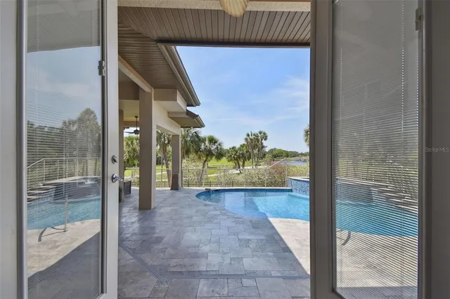 a kitchen with stainless steel appliances granite countertop a stove and cabinets