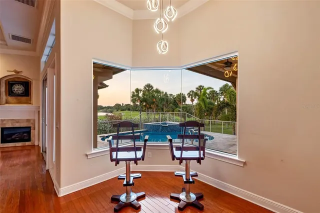 a spacious bathroom with a tub sink and mirror