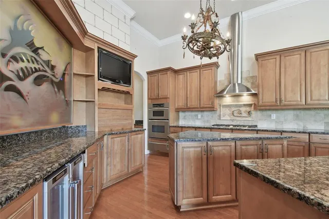 a bathroom with a sink a vanity and a mirror