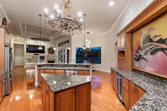 an empty room with a window and a ceiling fan
