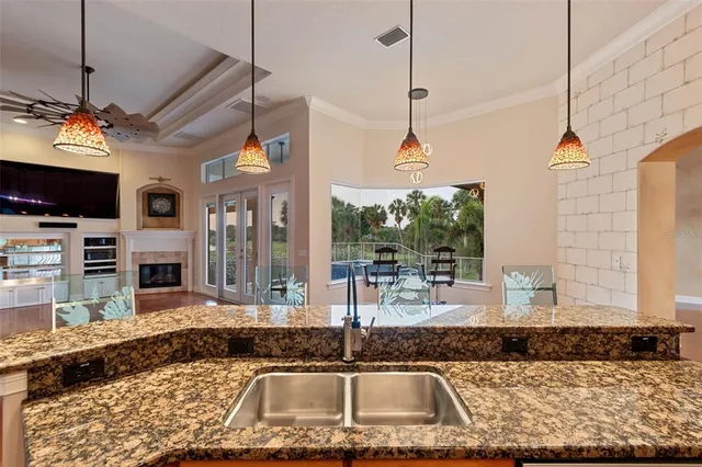 an empty room with a window and a bathroom