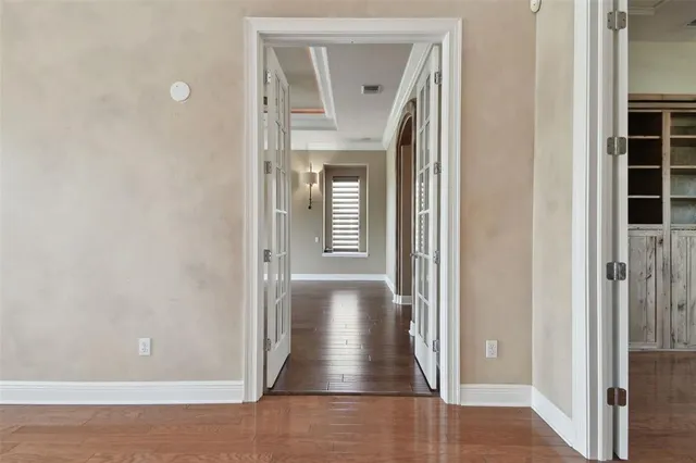 a view of an empty room with a window