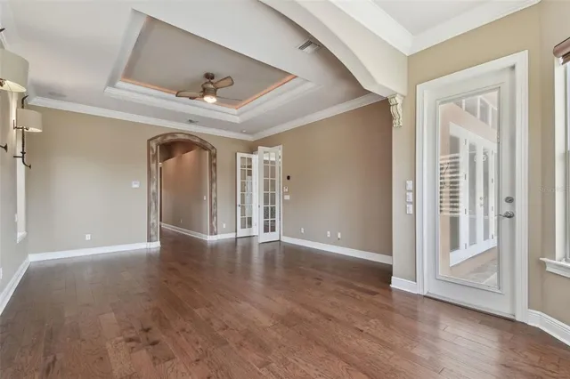 a view of walk in closet with empty racks