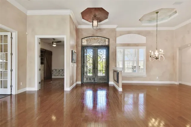 a view of a glass door and the balcony