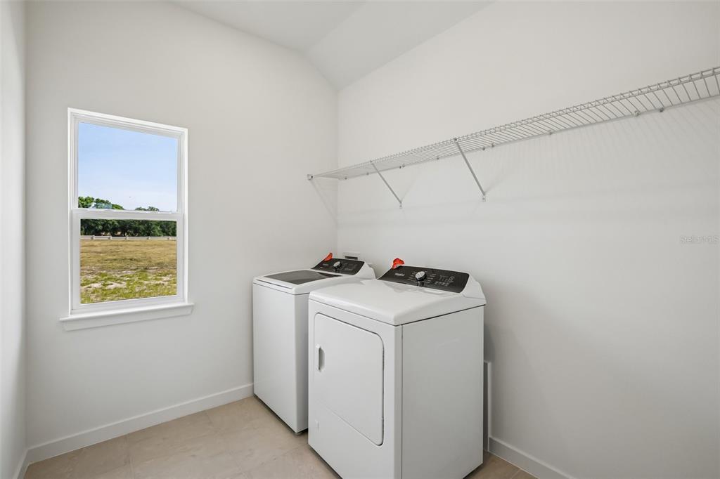 9932 Redwood Rdg Avenue Riverview, FL 33578 - Photo 21 of 38 a utility room with dryer and washer