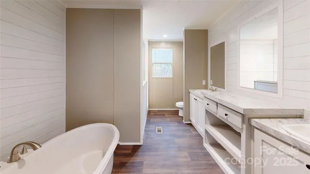 a bathroom with a sink and a large mirror