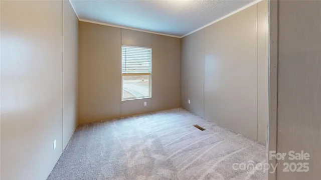 a view of a room that has a window in it