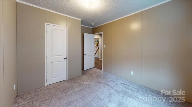a view of hallway with natural light