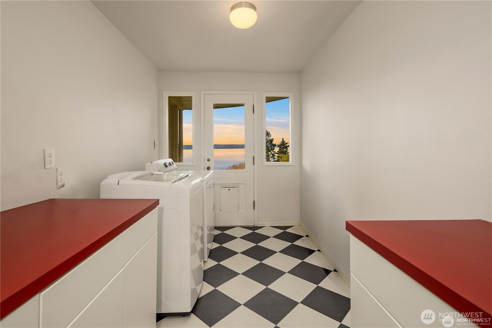 727 Southwest 199th Place Normandy Park, WA 98166 - Photo 26 of 38 a room with a sink and a washing machine