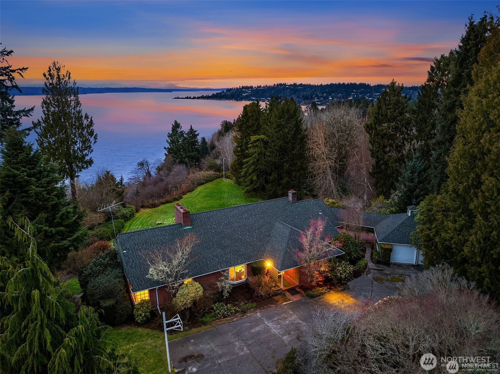727 Southwest 199th Place Normandy Park, WA 98166 - Photo 3 of 38 an aerial view of a house with mountain view