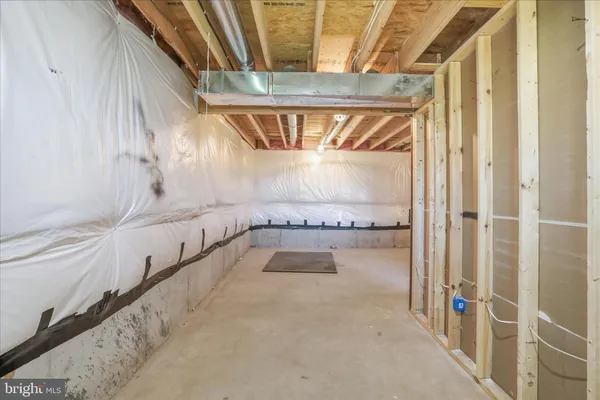 a view of a room with wooden walls