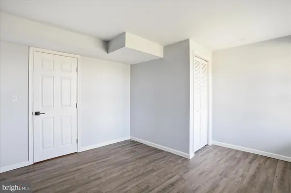 a view of balcony with wooden floor